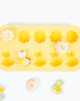 flat lay yellow Emerypets bee daisy treat mold freeze snack for pet