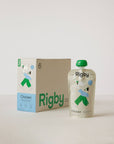 Rigby chicken dog food packaging including a box and a pouch on a light background