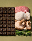 Ryoken Instinct Pork Bar Ingredients Pork Mushroom Rosemary on Green Background