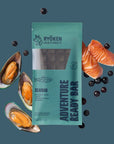 Ryoken Instinct Seafood Dog Treat with salmon mussel and blueberry on deep ocean background