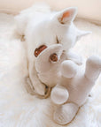 white dog play with Fur Elise Pets Ella Elephant Plushie for dog