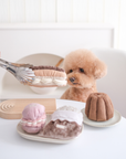 red bichon poodle sit next to lambwolf collective plush toys