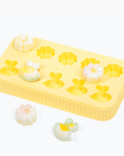top of yellow Emerypets bee daisy treat mold freeze snack for pet