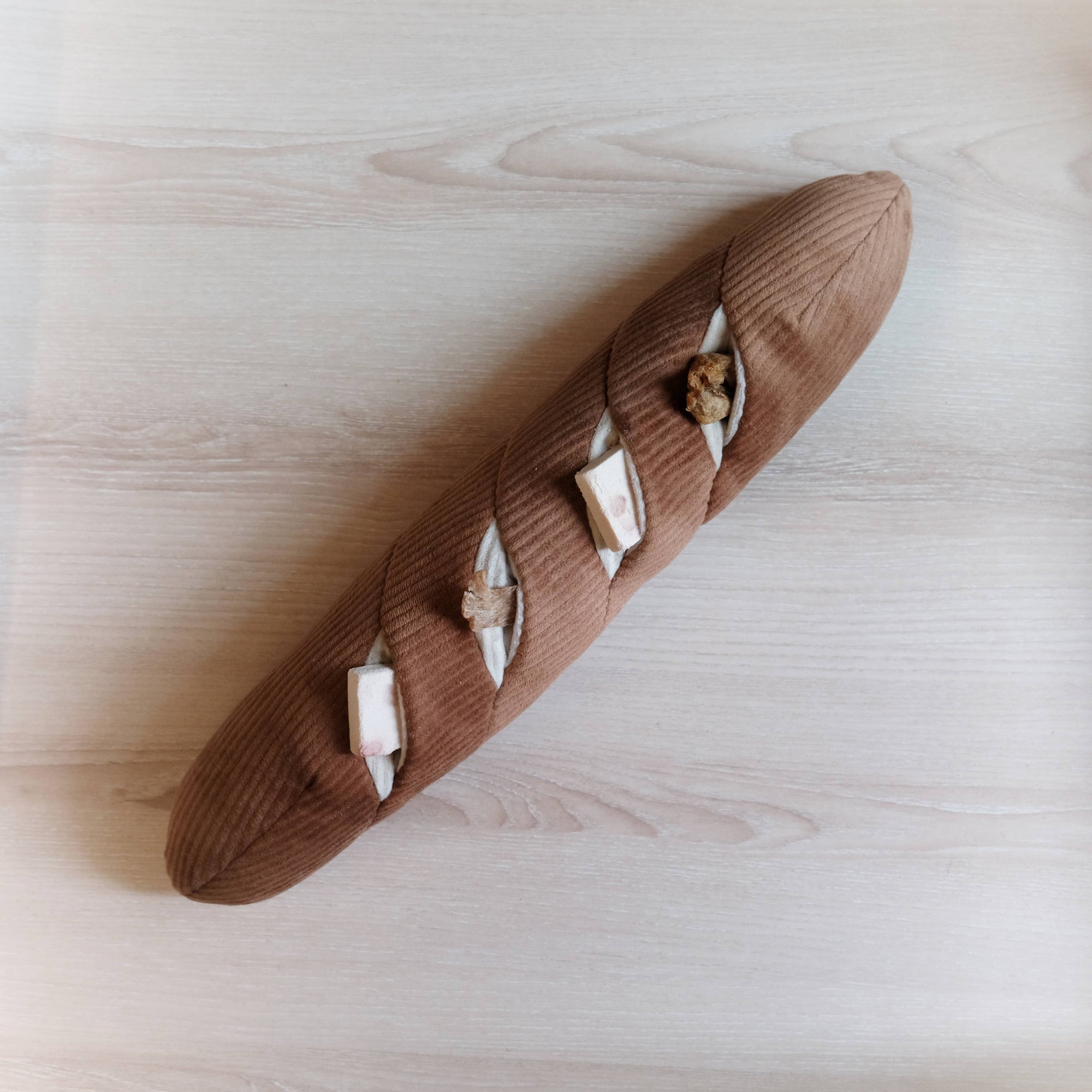 dog treat in Lambwolf Collective Baguette nose work plush toy