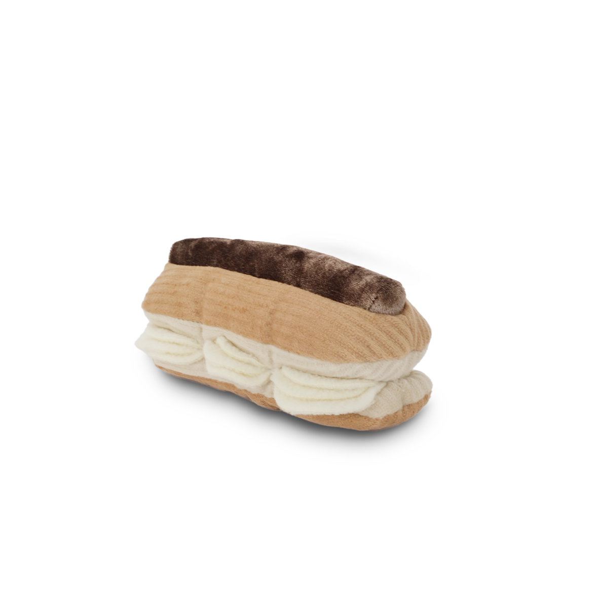 Lambwolf Collective A stuffed dog toy designed to resemble a eclair with cream and brown fur detailing, with squeaky flaps.