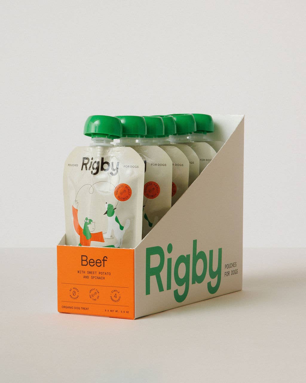 Packaging of Rigby pet food with bottles and a box on a white background