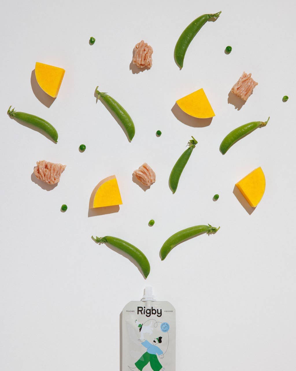 Product with green beans and cheese slices on a white background, featuring the brand 'Rigby' dog pouch treat.